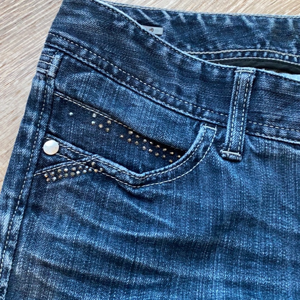 Express Mid Rise Darker Wash Skinny Jeans - Picture 3 of 11